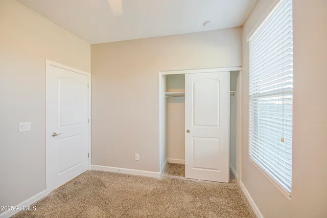 an empty room with closet