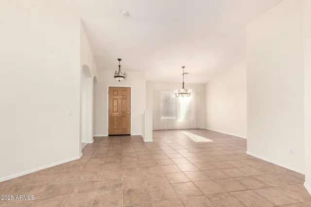 a view of a kitchen with a sink and a window
