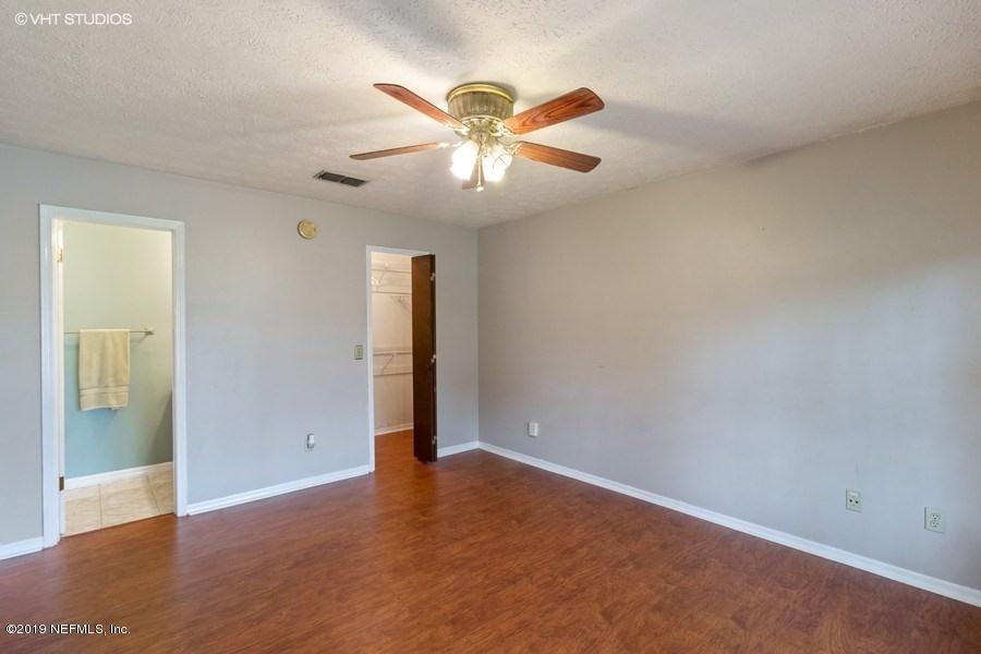 2262 George Wythe Road Orange Park, FL 32073 - Photo 8 of 15 08_2262GeorgeWytheRd_178_MasterBedroom_L