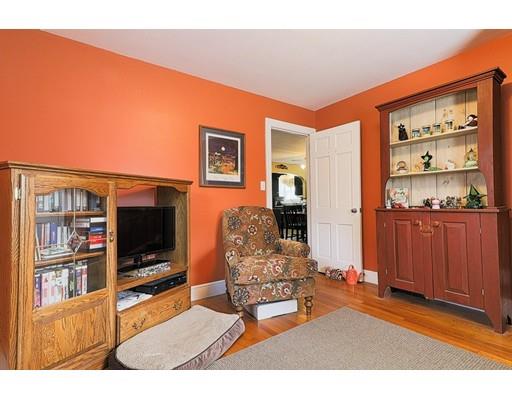 24 Devens Road Worcester, MA 01606 - Photo 11 of 25 a living room with furniture and a flat screen tv