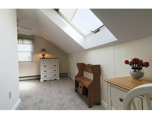 24 Devens Road Worcester, MA 01606 - Photo 18 of 25 a bedroom with furniture and a window