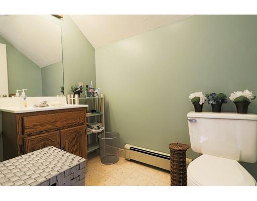 24 Devens Road Worcester, MA 01606 - Photo 20 of 25 a bathroom with a sink toilet and mirror