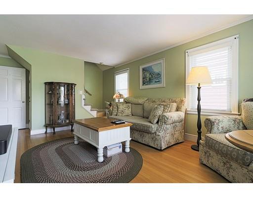 24 Devens Road Worcester, MA 01606 - Photo 4 of 25 a living room with furniture and a table