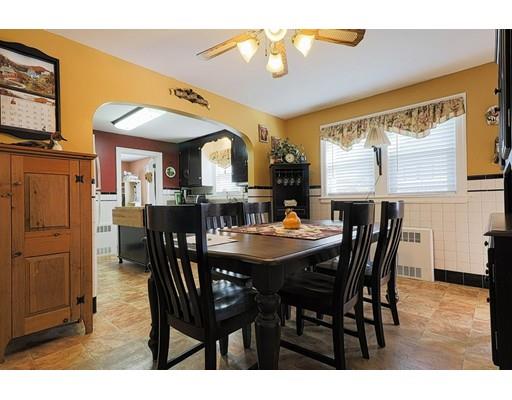 24 Devens Road Worcester, MA 01606 - Photo 6 of 25 a view of a dining room with furniture and wooden floor