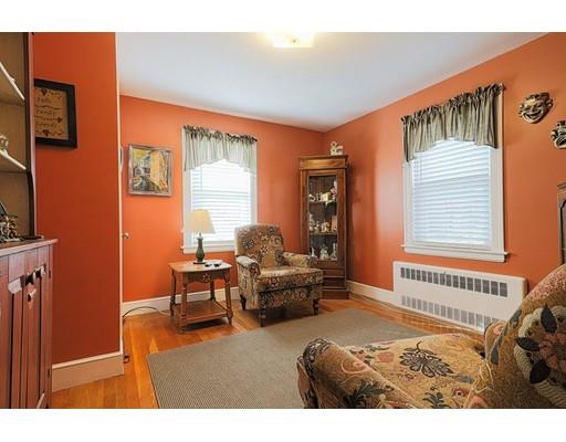 24 Devens Road Worcester, MA 01606 - Photo 10 of 25 a living room with furniture and a large window