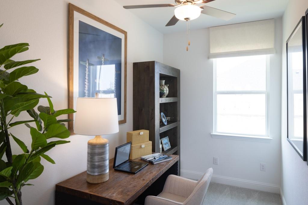 15009 Horseshoe Post Road Fort Worth, TX 76052 - Photo 12 of 25 a dining room with furniture and a potted plant