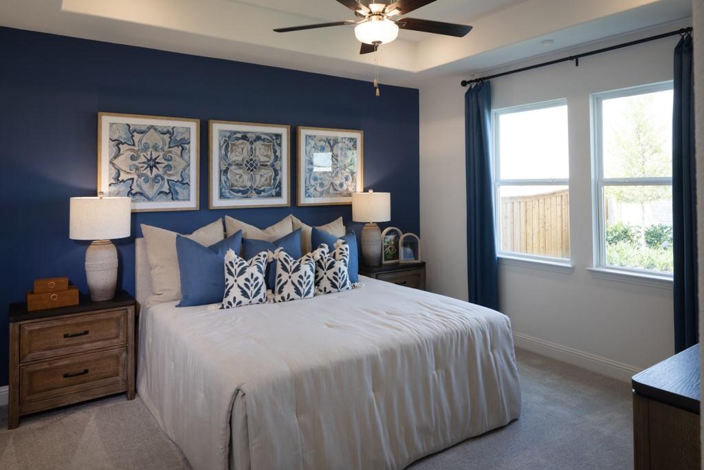 15009 Horseshoe Post Road Fort Worth, TX 76052 - Photo 14 of 25 a bedroom with a large bed and a window