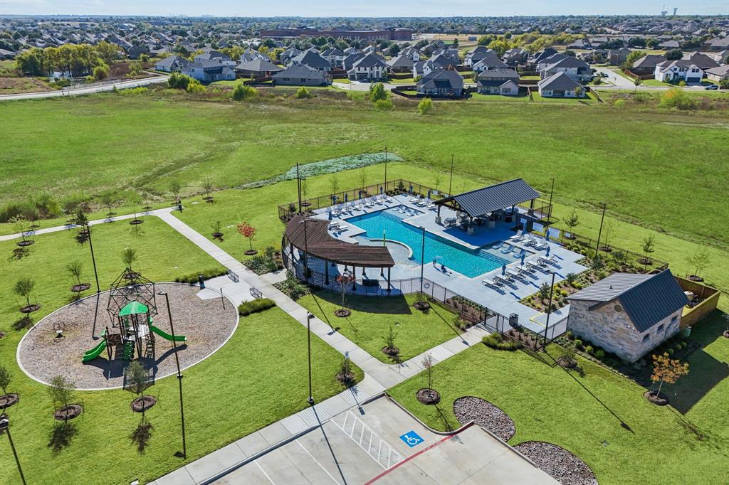 15009 Horseshoe Post Road Fort Worth, TX 76052 - Photo 16 of 25 an aerial view of a house with a garden and lake view