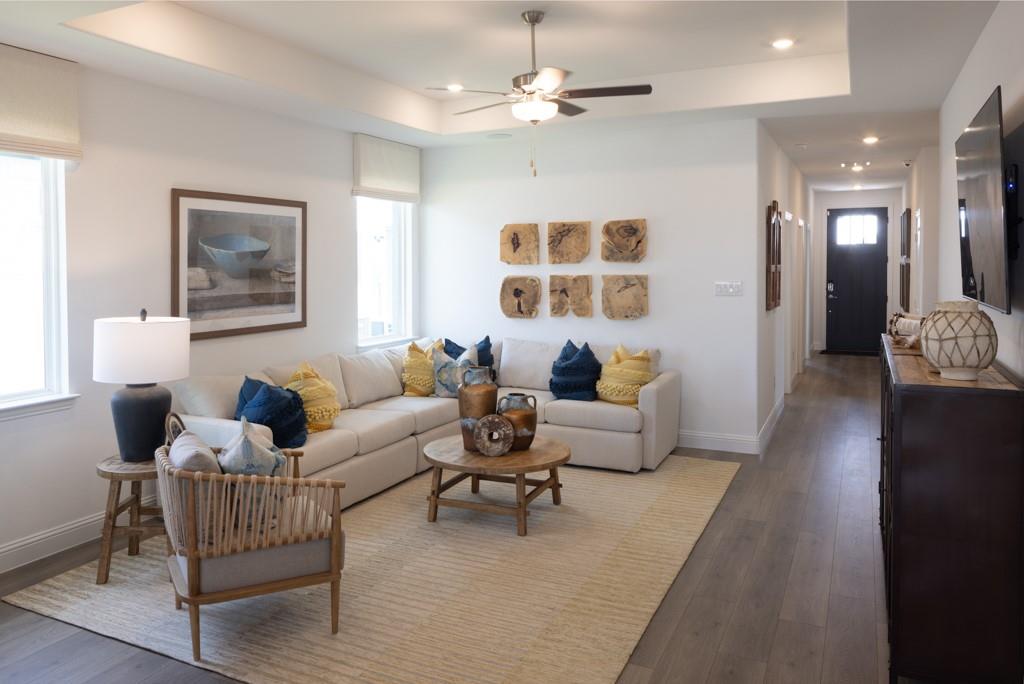 15009 Horseshoe Post Road Fort Worth, TX 76052 - Photo 7 of 25 a living room with furniture and a chandelier