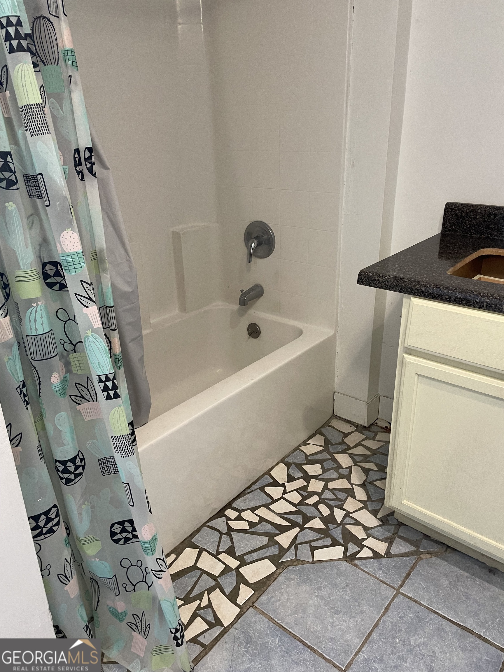 304 East 19th Street Rome, GA 30161 - Photo 15 of 15 a bathroom with a tub sink and mirror