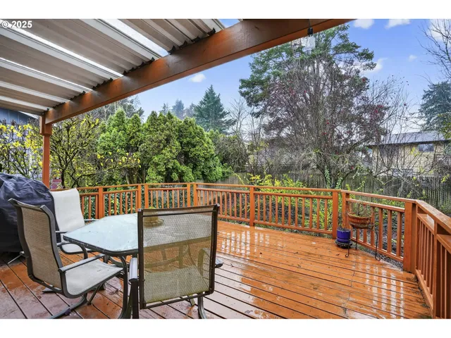 a view of a chairs and table on the wooden floor