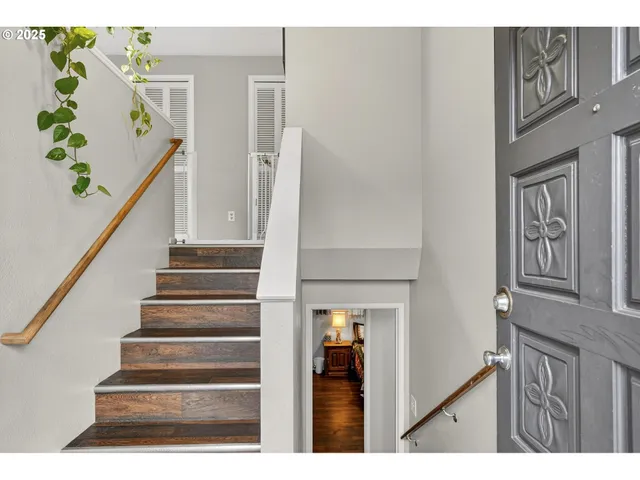 a view of entryway with a front door