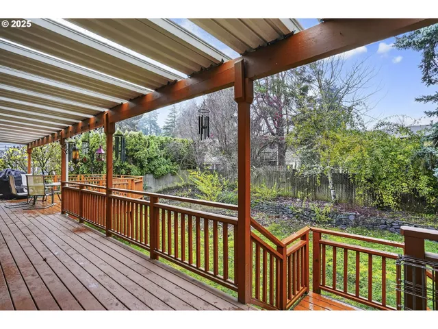 a balcony with wooden floor in outdoor space