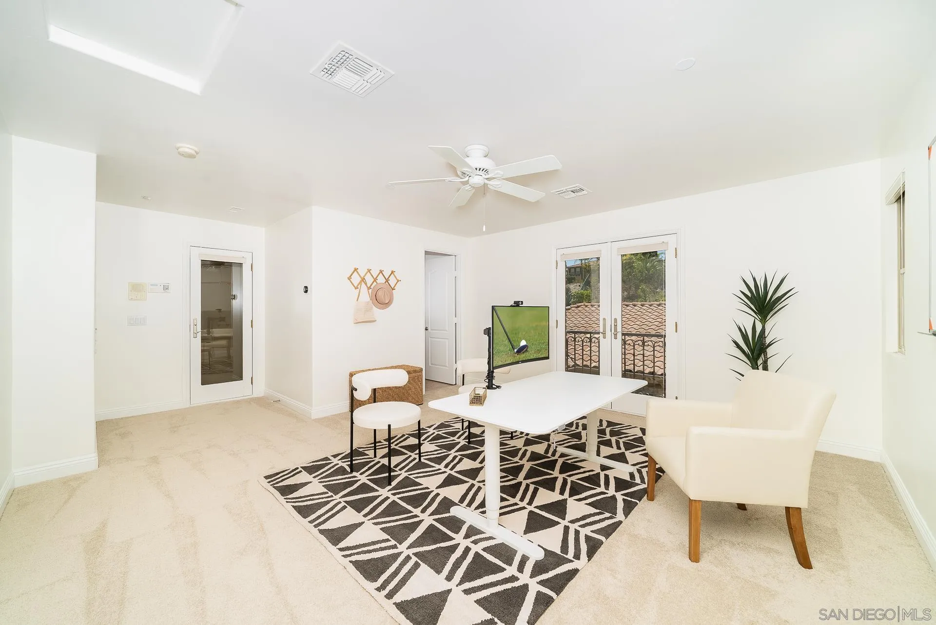 14757 Whispering Ridge Road San Diego, CA 92131 - Photo 13 of 48 a living room with furniture