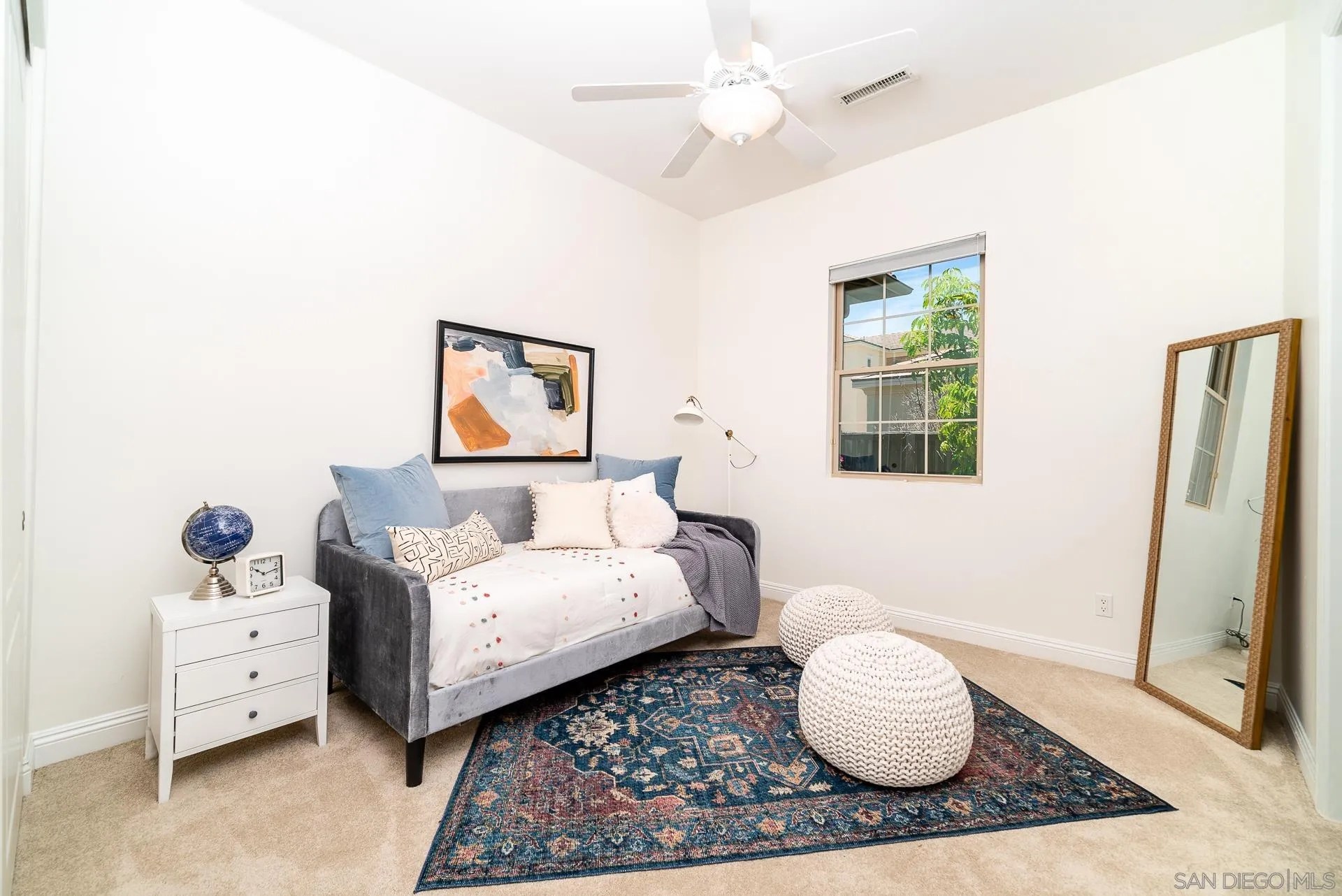 14757 Whispering Ridge Road San Diego, CA 92131 - Photo 23 of 48 a bedroom with a bed and a window