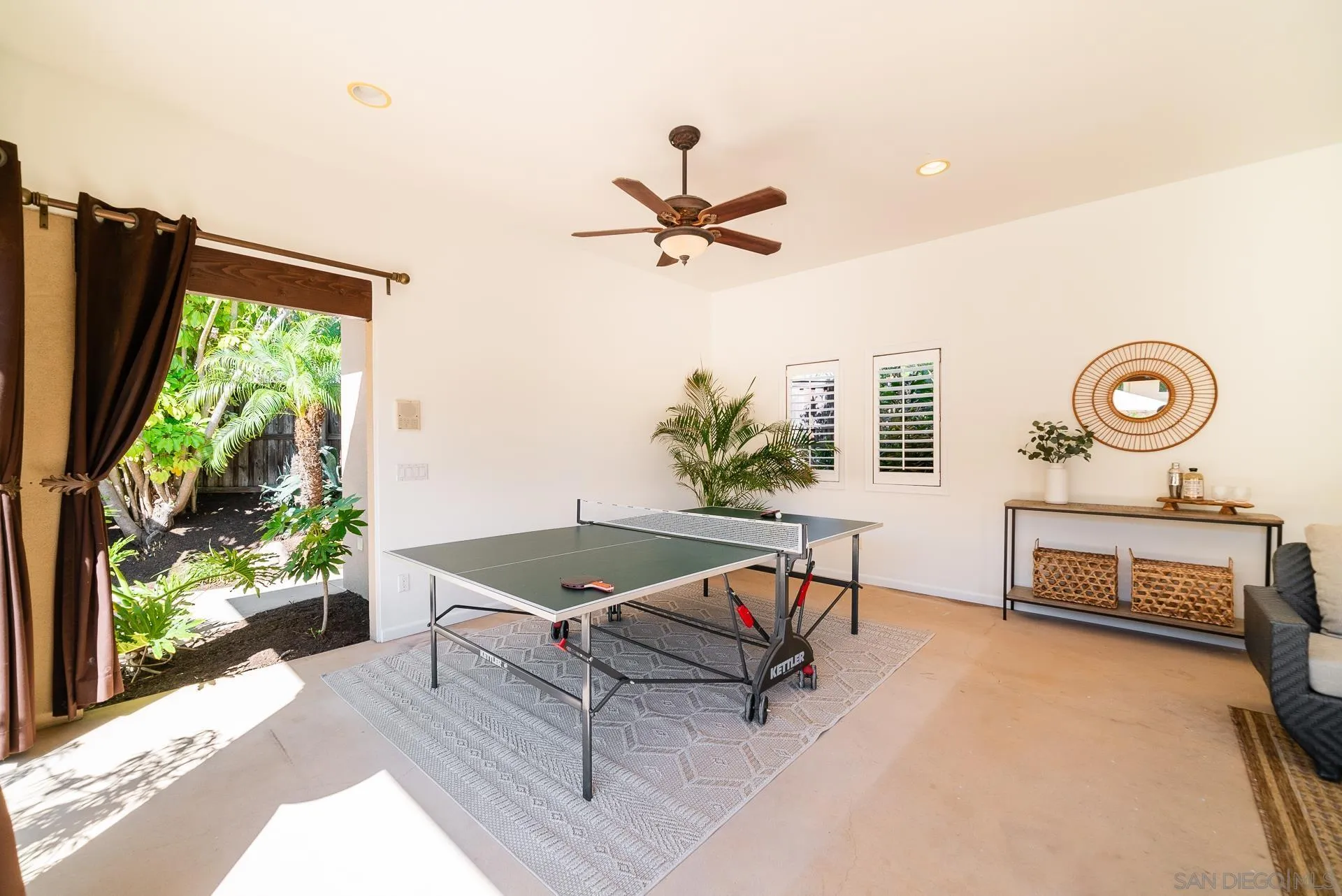 14757 Whispering Ridge Road San Diego, CA 92131 - Photo 29 of 48 a living room with furniture and a window