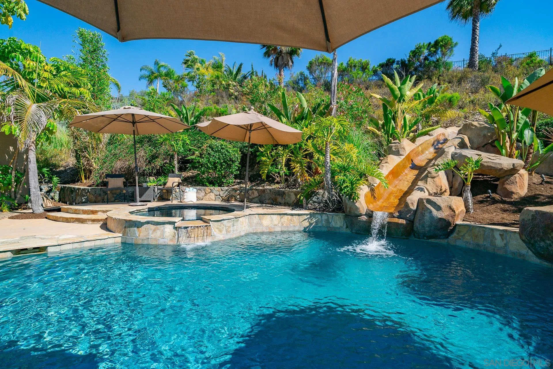 14757 Whispering Ridge Road San Diego, CA 92131 - Photo 34 of 48 a swimming pool with outdoor seating and yard