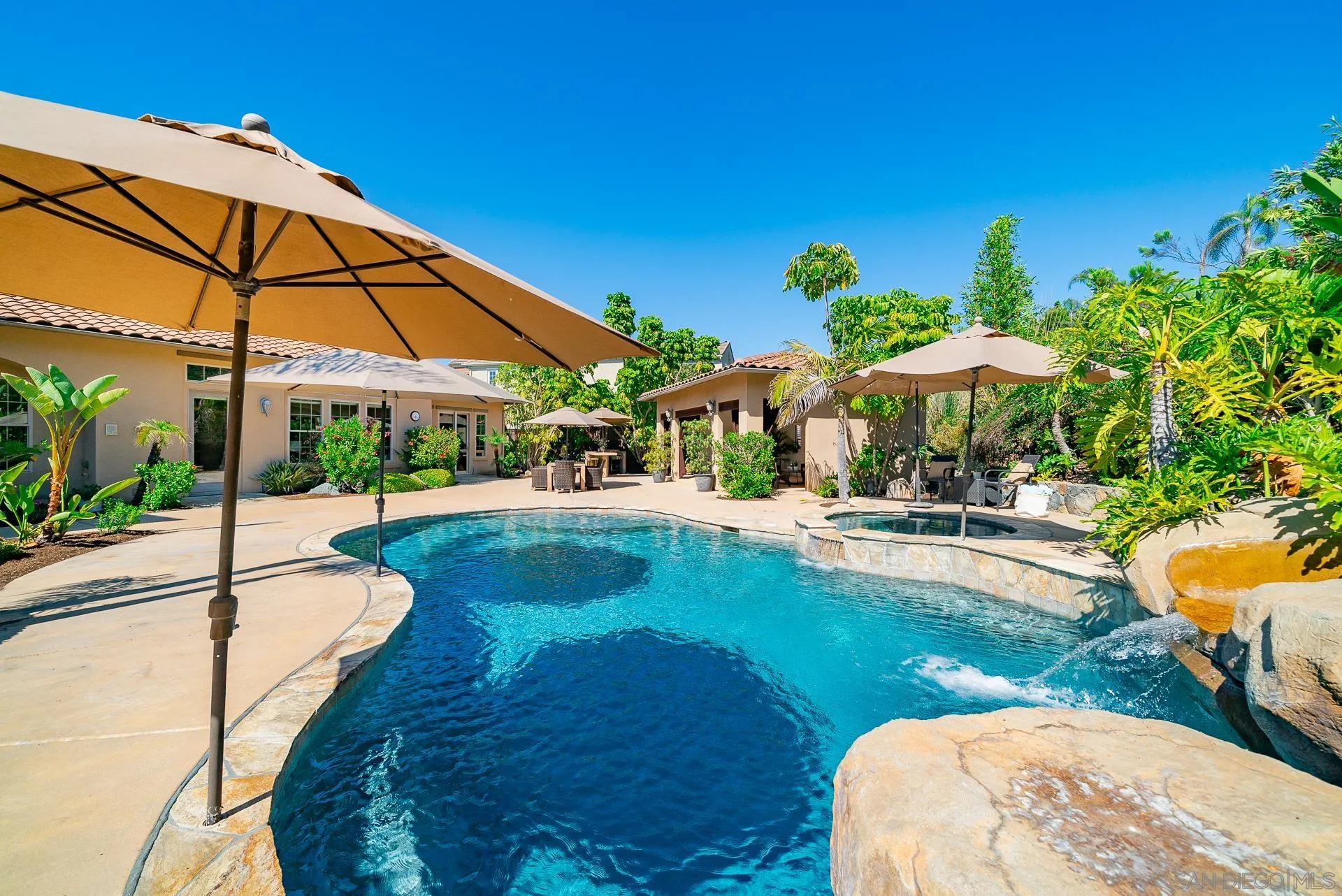 14757 Whispering Ridge Road San Diego, CA 92131 - Photo 35 of 48 a view of a swimming pool with a patio