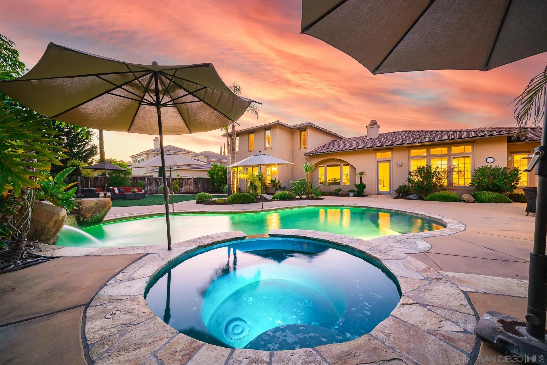 14757 Whispering Ridge Road San Diego, CA 92131 - Photo 40 of 48 a view of a swimming pool with a garden