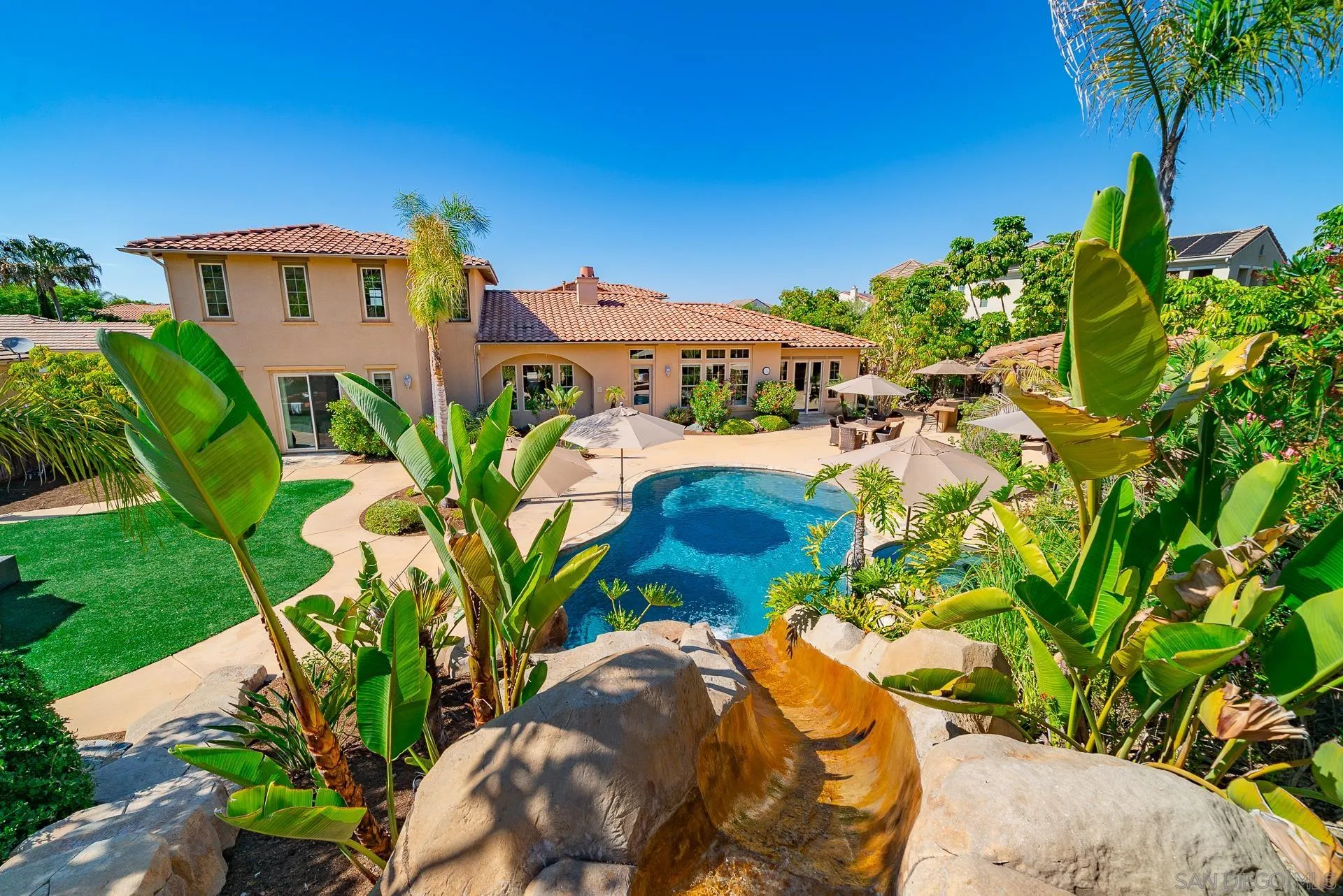 14757 Whispering Ridge Road San Diego, CA 92131 - Photo 48 of 48 a view of a house with a yard