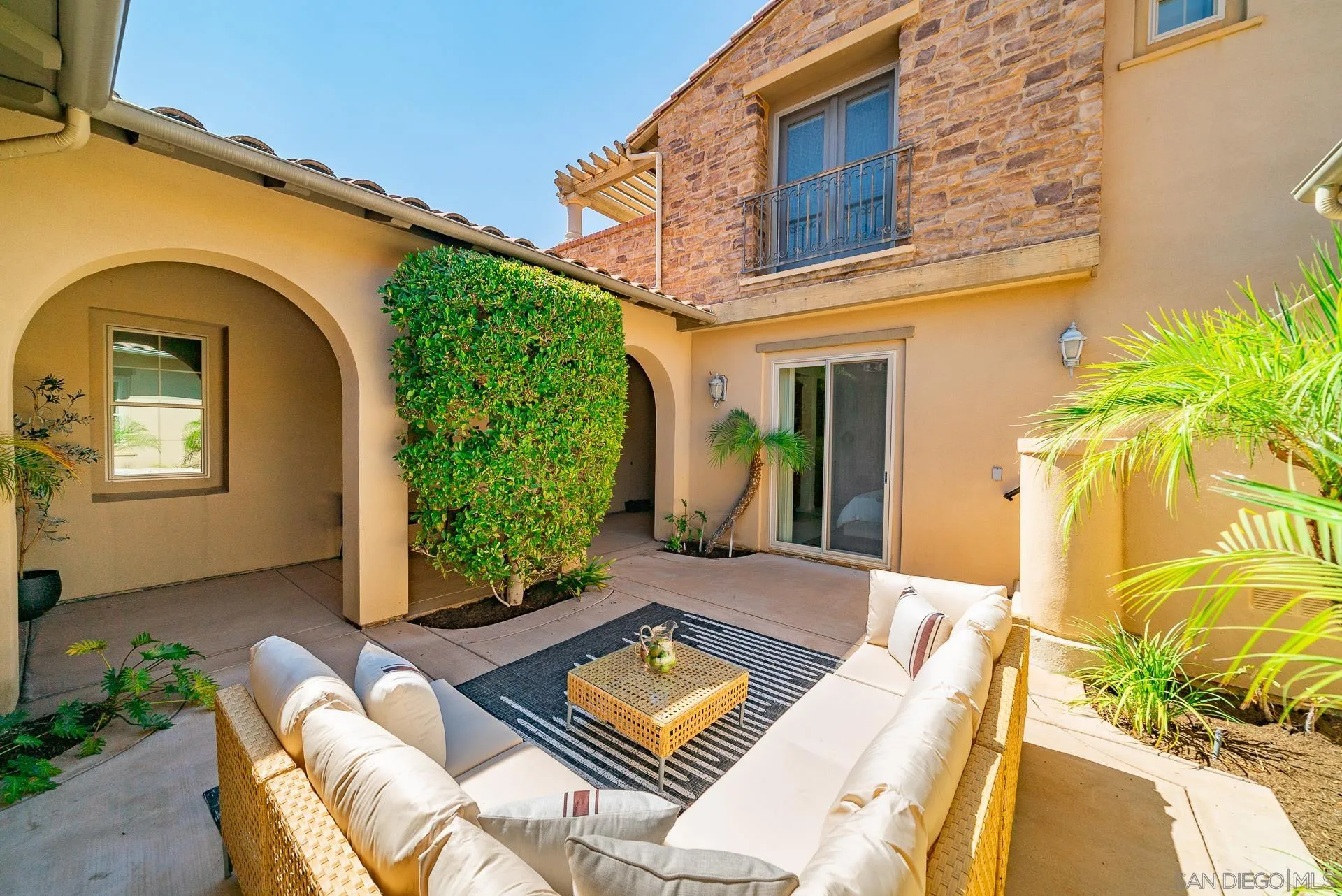 14757 Whispering Ridge Road San Diego, CA 92131 - Photo 7 of 48 a view of a two chairs in the patio