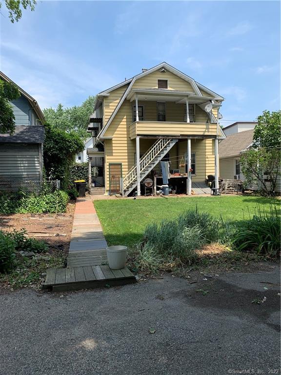 a front view of a house with yard
