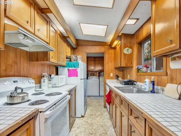 a kitchen that has a lot of cabinets