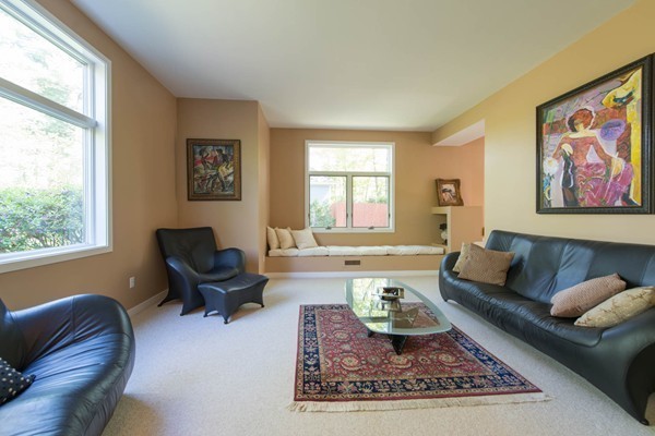 8 Frost Street Natick, MA 01760 - Photo 2 of 28 a living room with furniture and a window