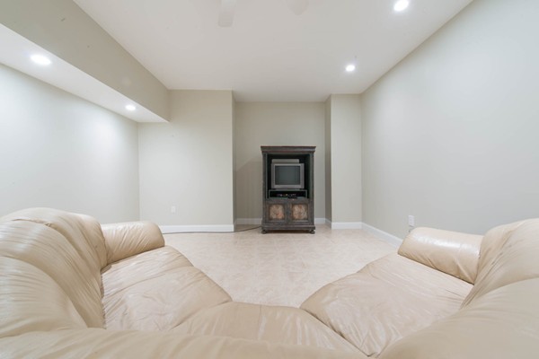 8 Frost Street Natick, MA 01760 - Photo 22 of 28 a living room with a couch