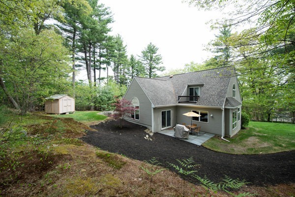 8 Frost Street Natick, MA 01760 - Photo 24 of 28 a view of a house with backyard and sitting area