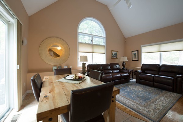8 Frost Street Natick, MA 01760 - Photo 10 of 28 a living room with furniture and a large window