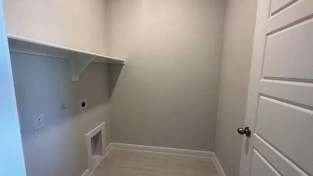 a view of a hallway with windows