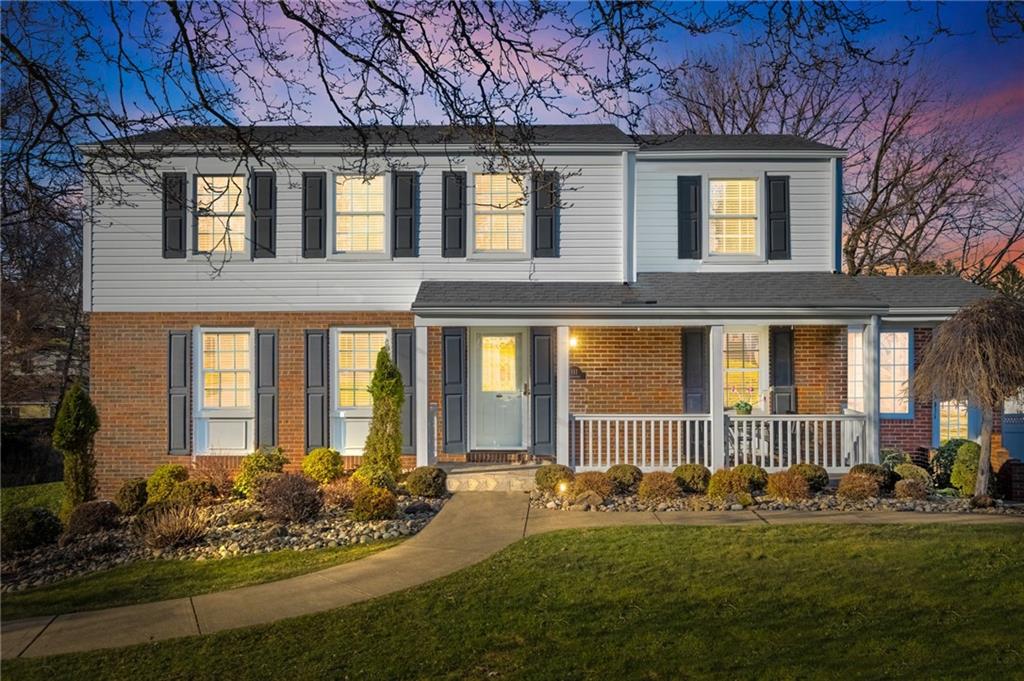 111 Lansdowne Drive Coraopolis, PA 15108 - Photo 2 of 42 a front view of a house with a garden