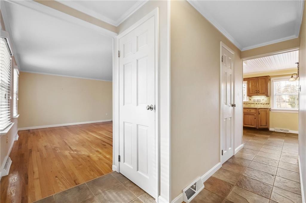 111 Lansdowne Drive Coraopolis, PA 15108 - Photo 9 of 42 a view of a kitchen with an empty space and a window