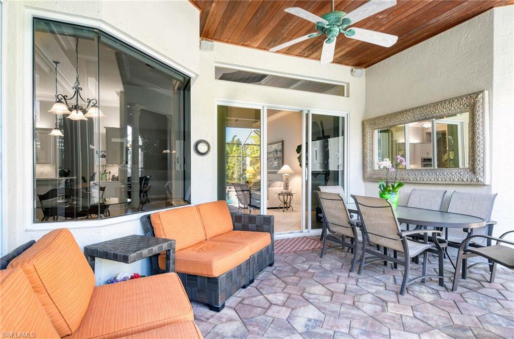 3002 Crayton Road Naples, FL 34103 - Photo 13 of 27 a outdoor space with patio furniture