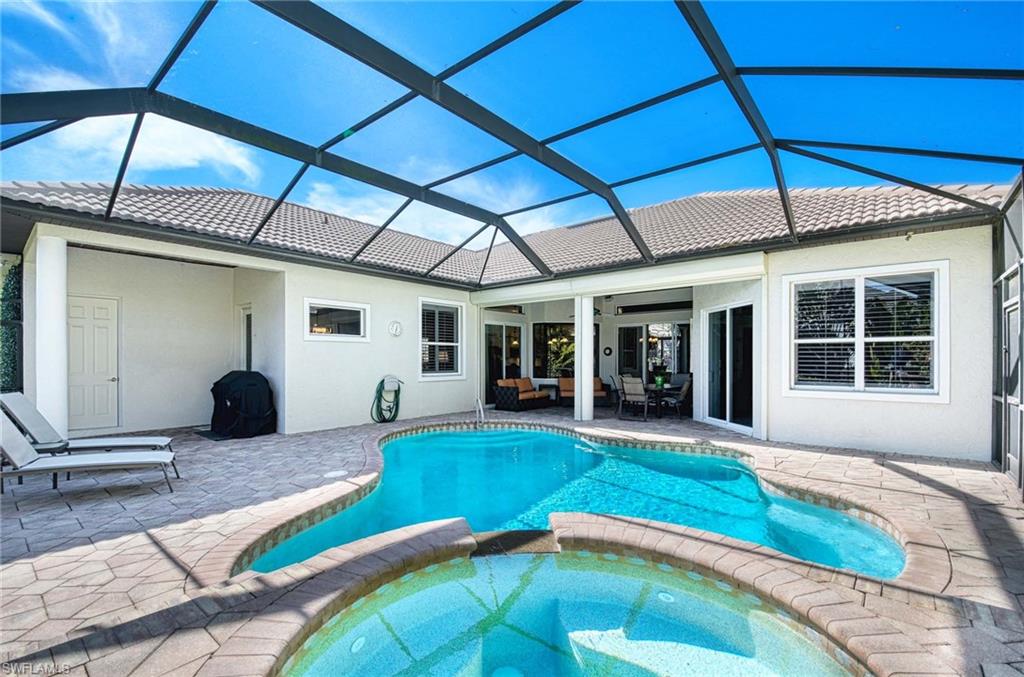 3002 Crayton Road Naples, FL 34103 - Photo 23 of 27 a house view with a sitting space