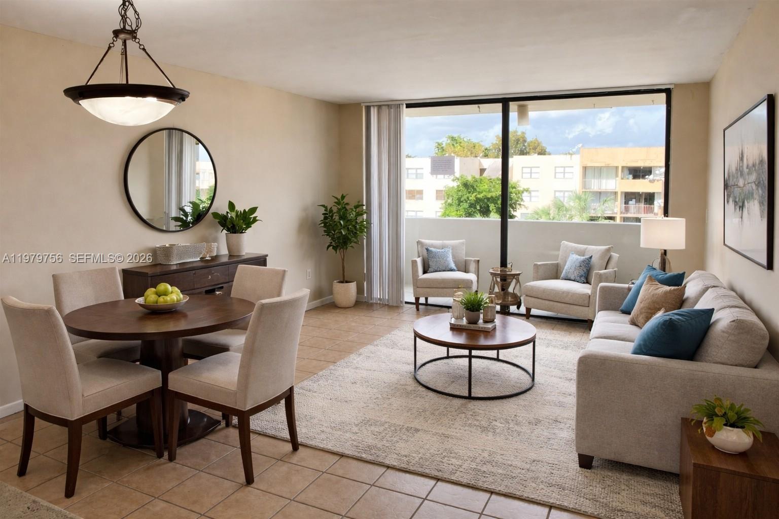 8002 Southwest 149th Avenue, Unit B409 Miami, FL 33193 - Photo 4 of 15 a living room with furniture a window and a potted plant