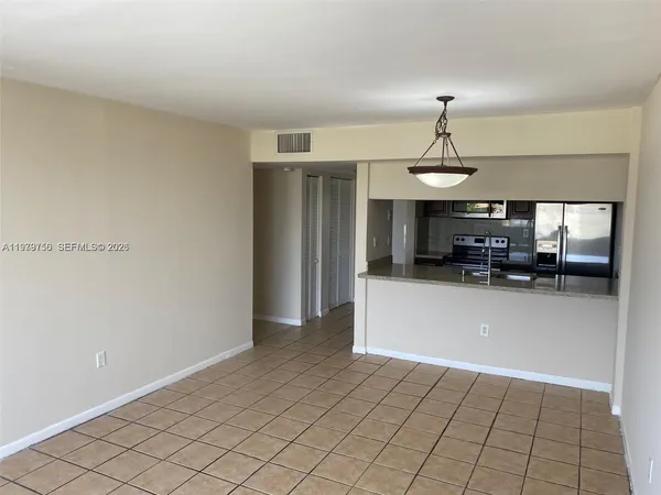 a view of a livingroom with furniture and window