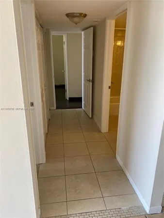 a view of hallway with shower