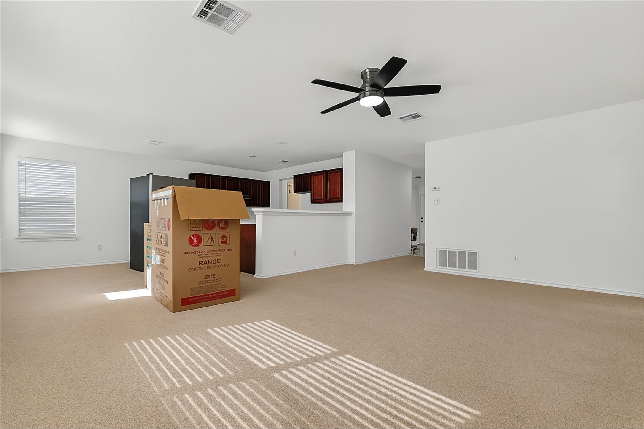 13505 Sierra Wind Lane Elgin, TX 78621 - Photo 11 of 18 a view of a livingroom with a workspace