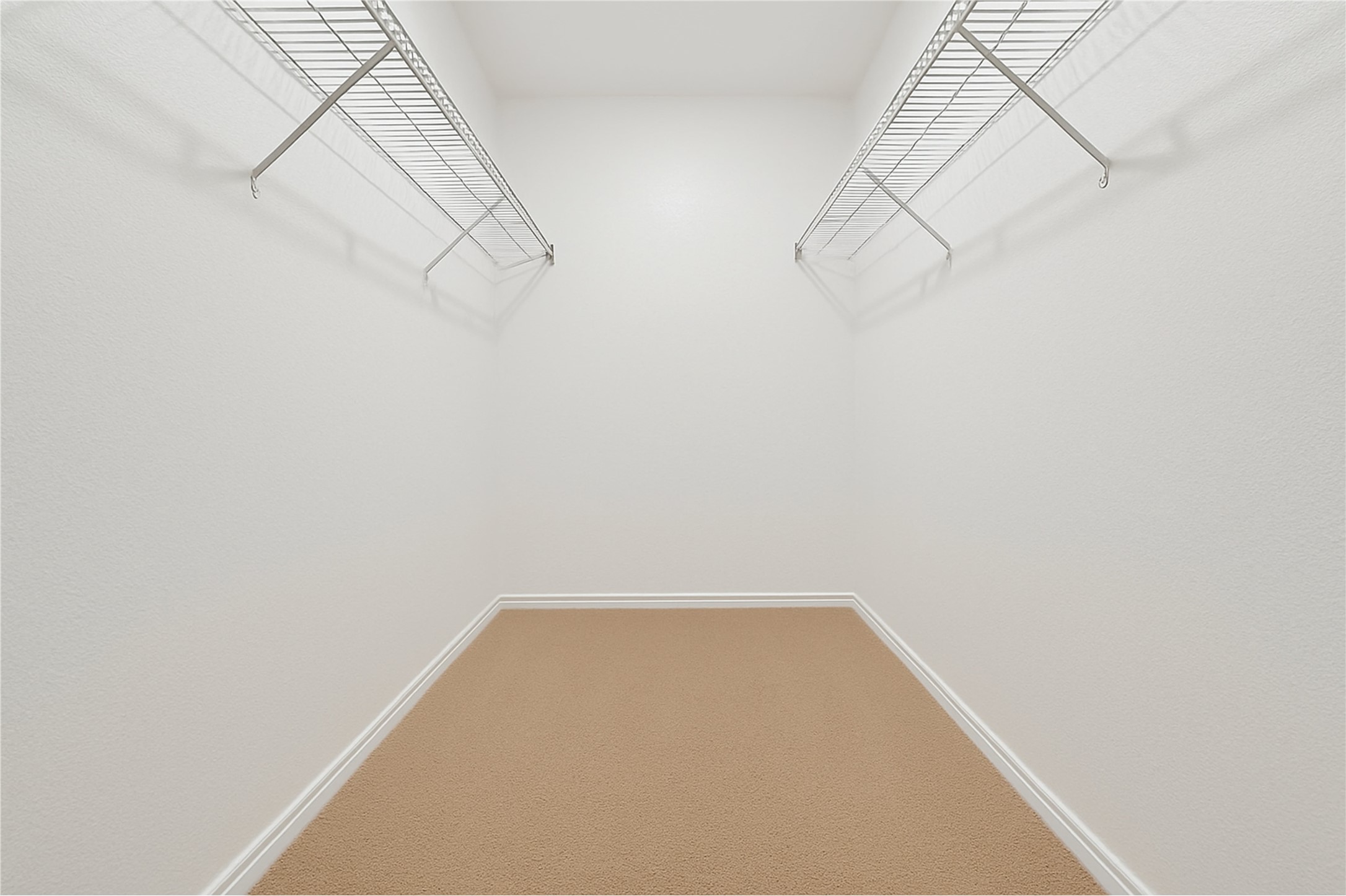 13505 Sierra Wind Lane Elgin, TX 78621 - Photo 18 of 18 a view of a room with racks on the wall