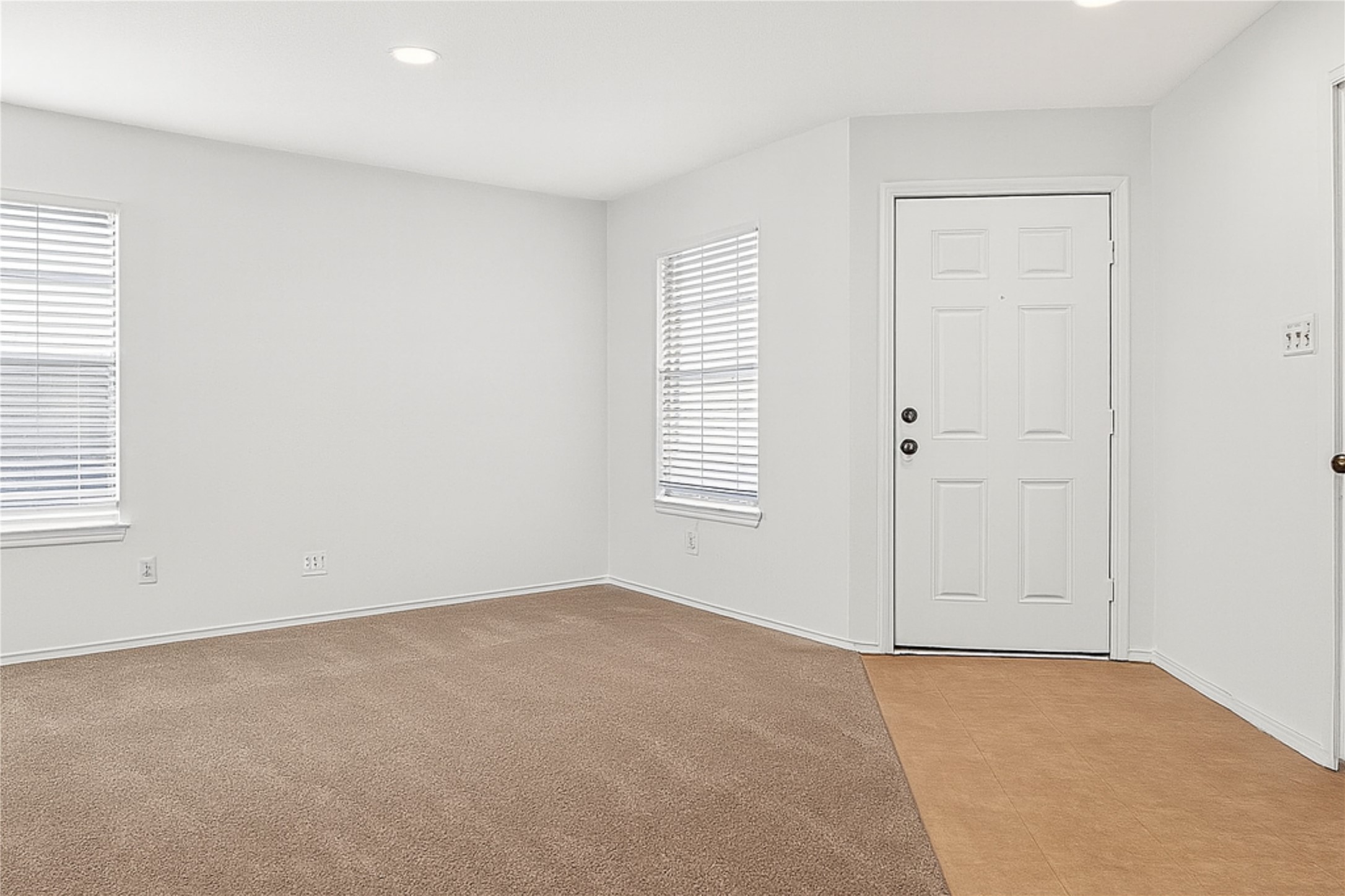 13505 Sierra Wind Lane Elgin, TX 78621 - Photo 6 of 18 an empty room with windows and closet