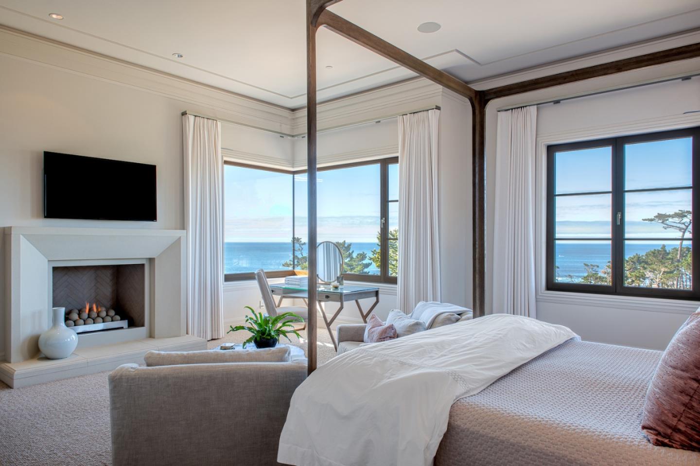 1231 Padre Lane Pebble Beach, CA 93953 - Photo 15 of 41 a living room with furniture a fireplace and a flat screen tv