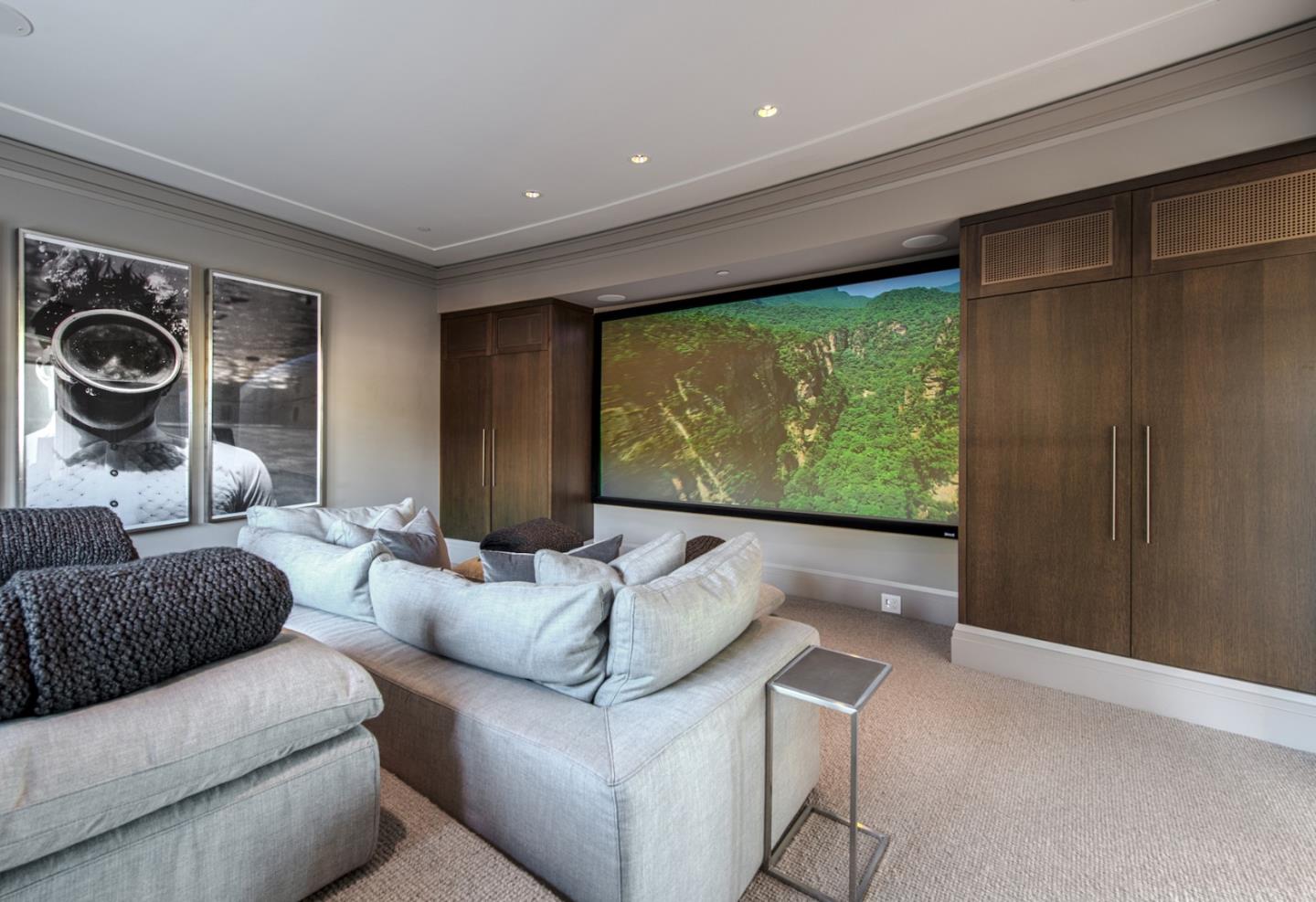 1231 Padre Lane Pebble Beach, CA 93953 - Photo 20 of 41 a living room with furniture and a flat screen tv