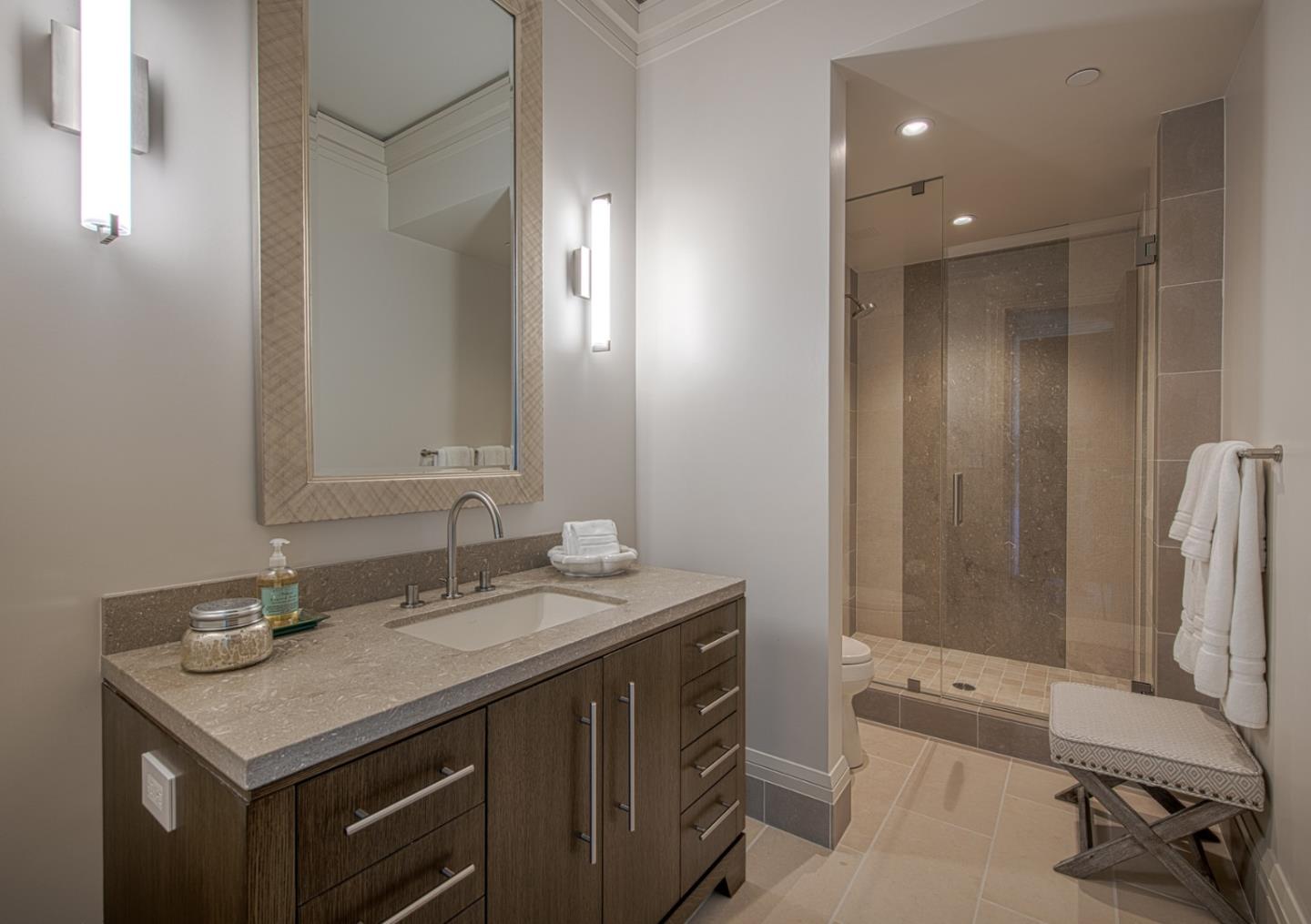 1231 Padre Lane Pebble Beach, CA 93953 - Photo 23 of 41 a bathroom with a sink double vanity and a mirror