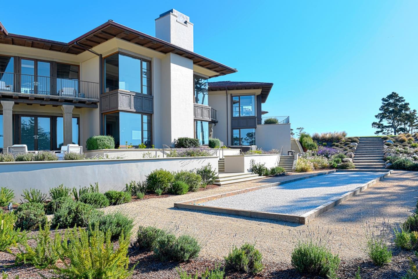 1231 Padre Lane Pebble Beach, CA 93953 - Photo 29 of 41 a front view of a house with garden