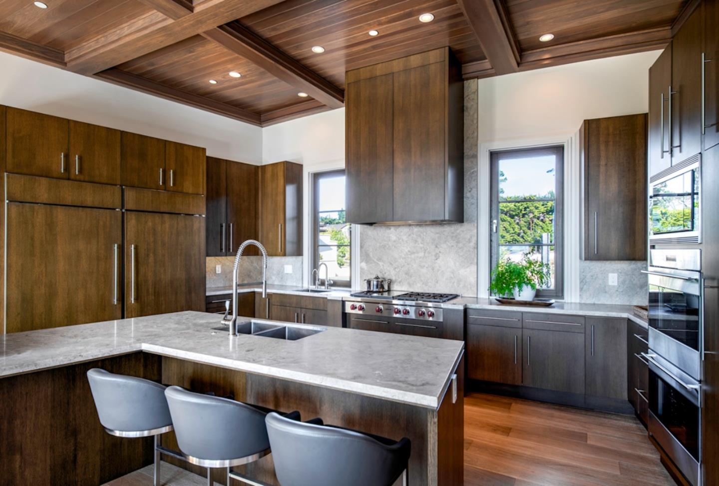 1231 Padre Lane Pebble Beach, CA 93953 - Photo 9 of 41 a kitchen with a sink cabinets and window