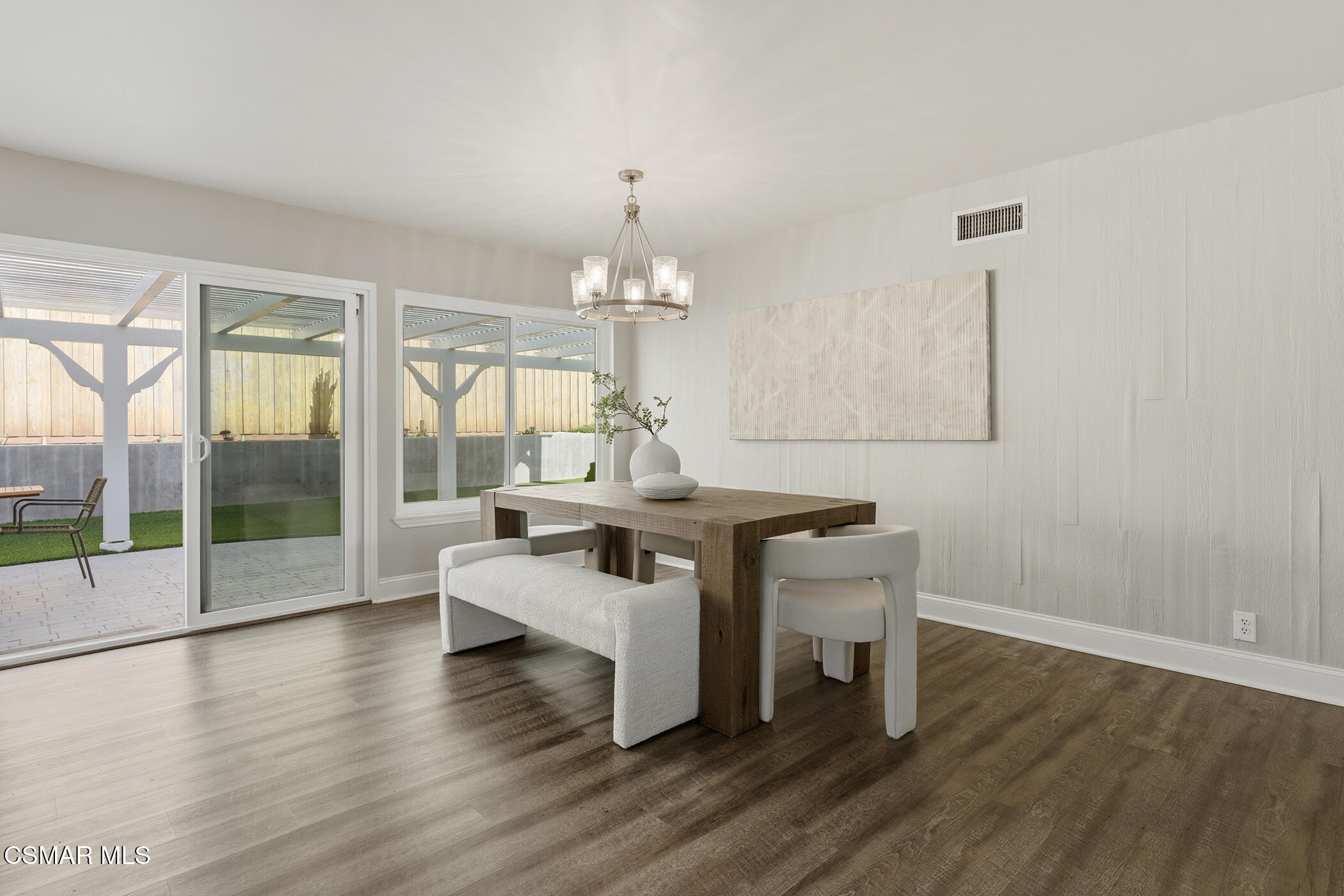 1860 Wychoff Avenue Simi Valley, CA 93063 - Photo 12 of 47 a living room with couches a coffee table and chandelier