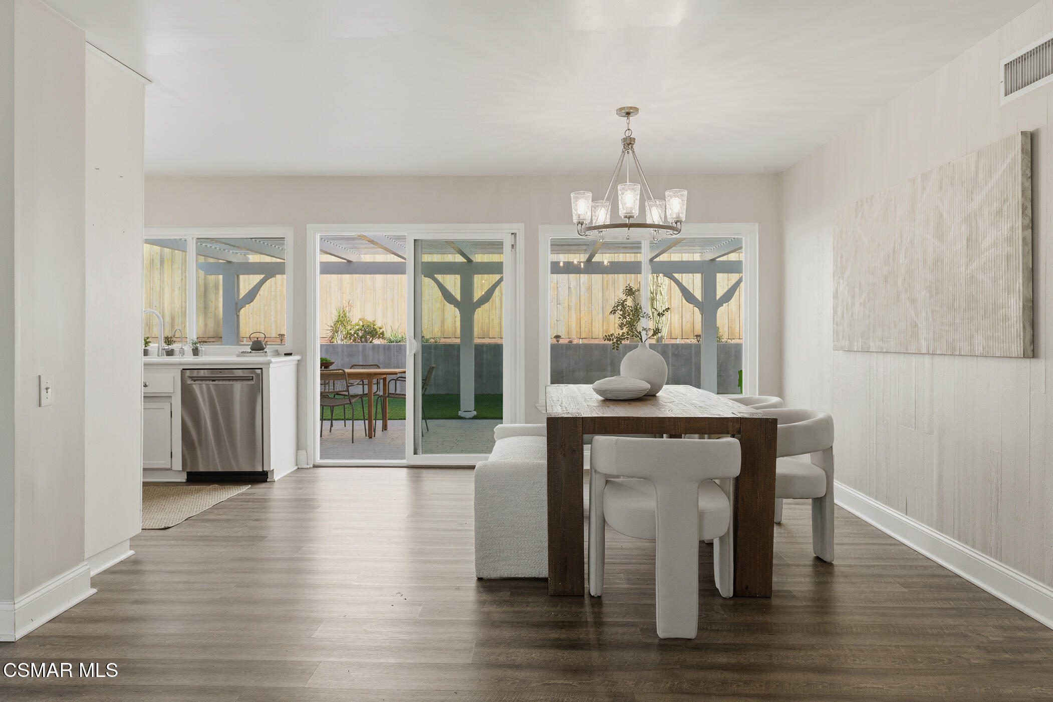 1860 Wychoff Avenue Simi Valley, CA 93063 - Photo 13 of 47 a view of a dining room with furniture wooden floor and chandelier
