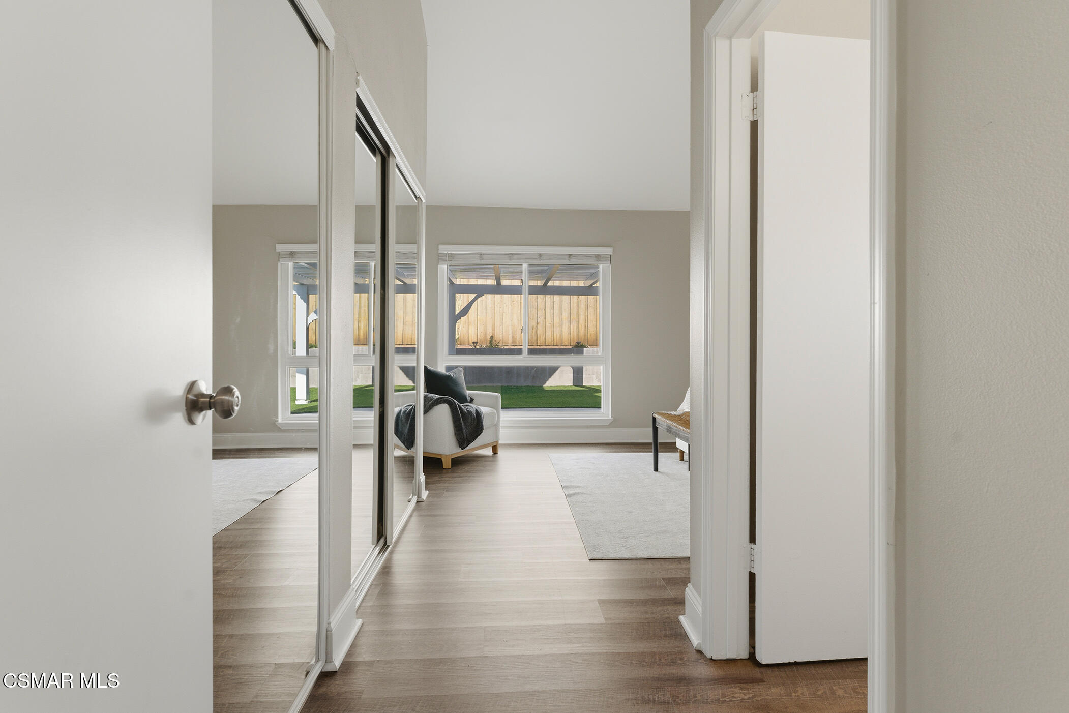 1860 Wychoff Avenue Simi Valley, CA 93063 - Photo 18 of 47 a view of a hallway with wooden floor and a living room